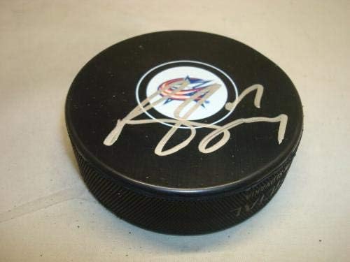Brandon Dubinsky potpisao je Columbus Blue Jackets hokejaški pak s potpisom 1A-s potpisom NHL Pakova